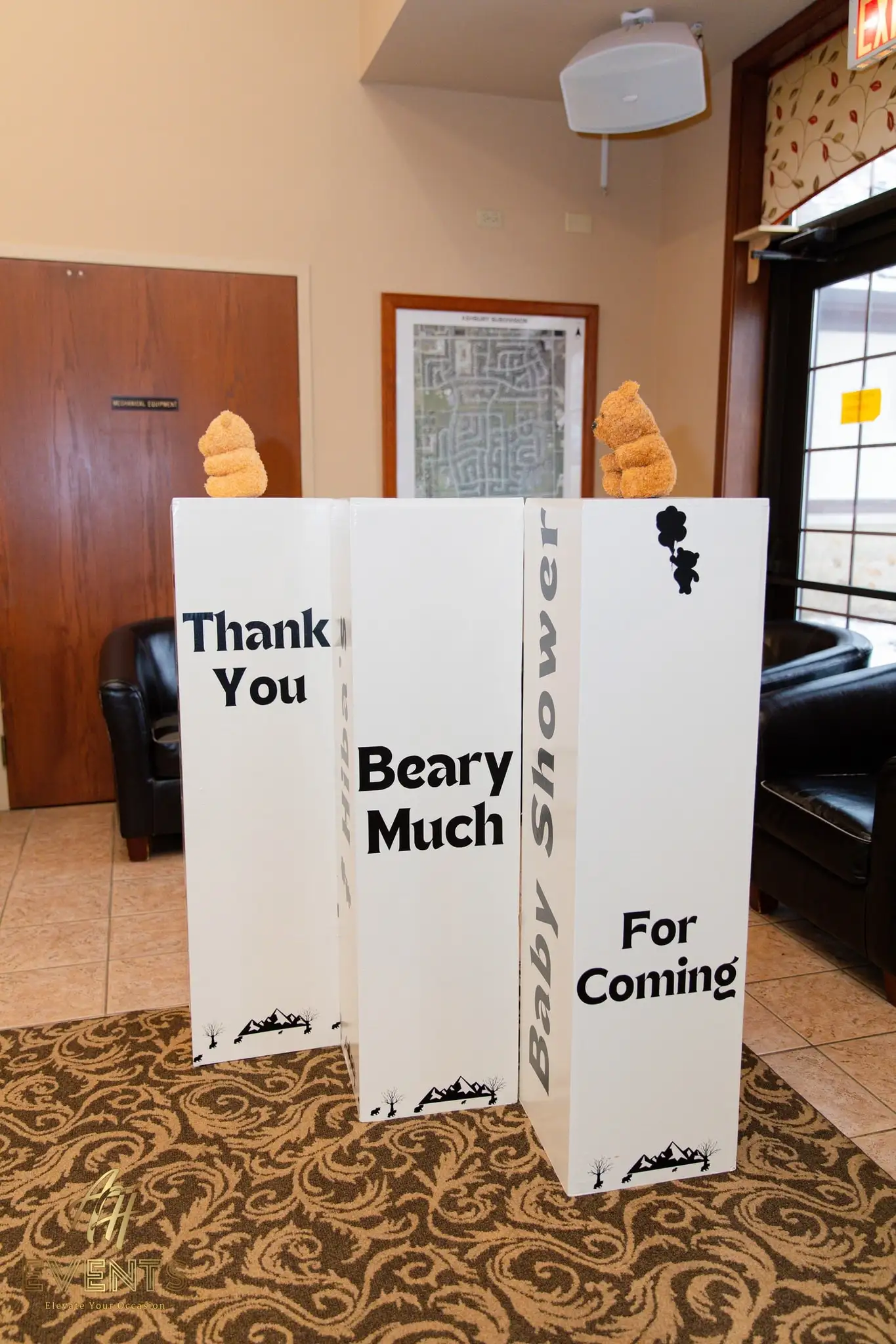 Standing sign boards reading 'Thank You Beary Much for Coming' with teddy bears at a bear-themed baby shower