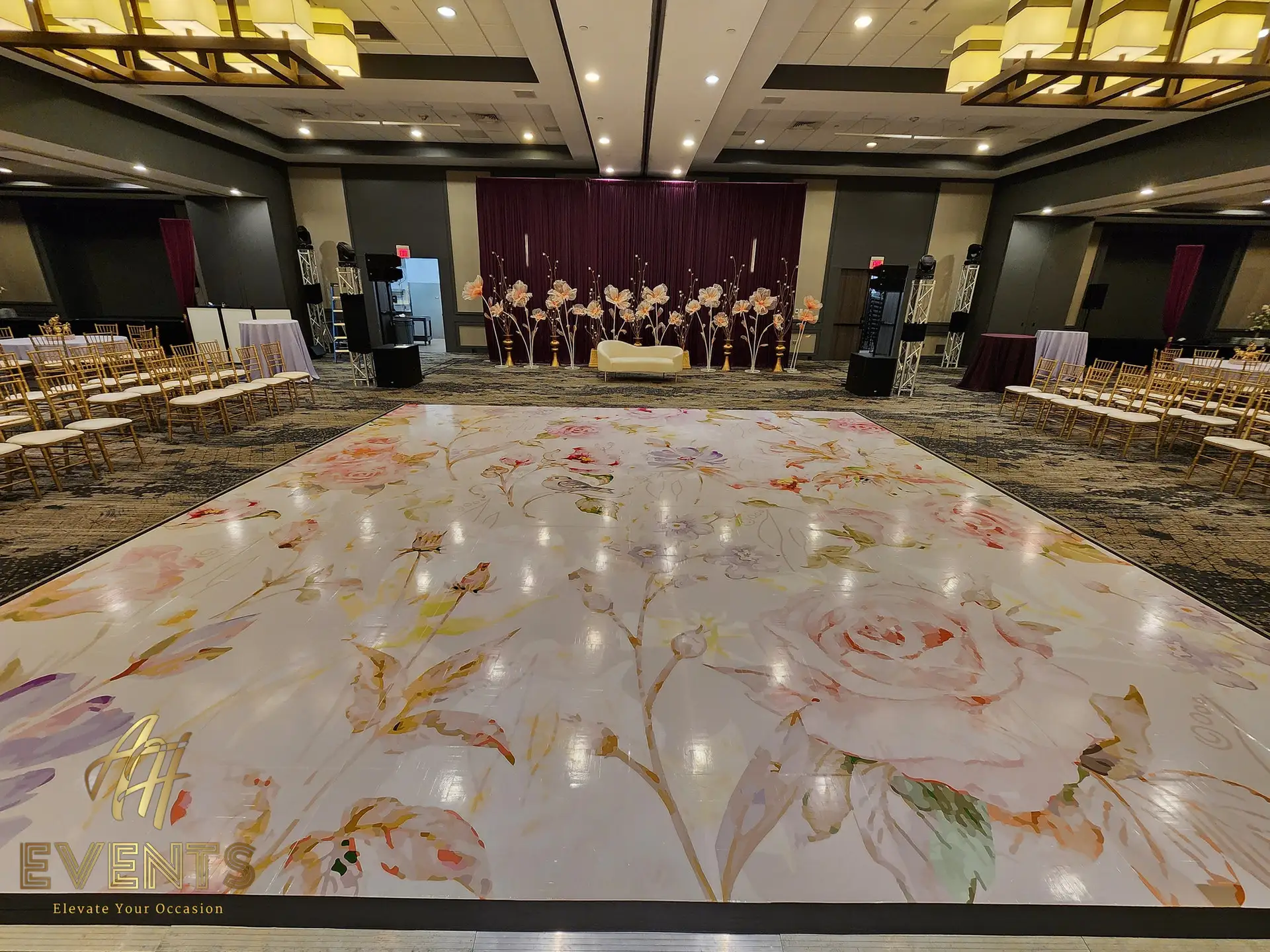 Custom floral vinyl wrap on a dance floor